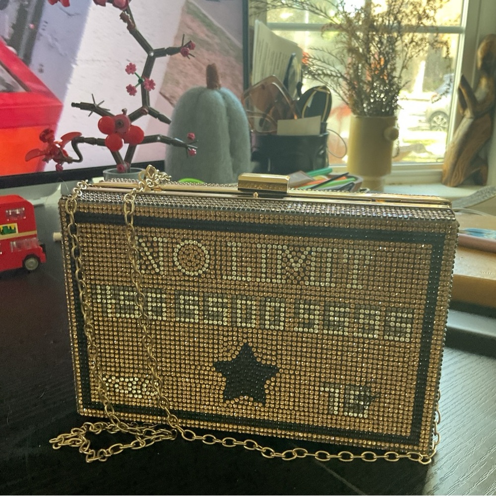 Glamorous Gold and Black Star Clutch